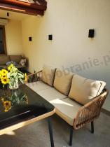 Aranżacja: Beżowa trzyosobowa sofa nataras 182 cm Postigo