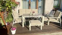 Aranżacja: Beżowy komplet aluminiowych mebli na taras dla 7 osób - sofa 200cm, fotele i pufy - Tavaro
