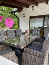 Aranżacja: Brązowy stół obiadowy z nogą X 220cm i 8 foteli Laritto - Dark Brown
