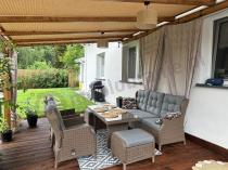 Aranżacja: Brązowy zestaw technorattanowy tarasowy Laritto Dining + pufy - Brown