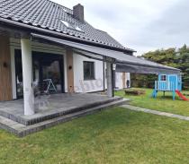 Aranżacja: Duża markiza na taras z półkasetą 495x300 Lea - Grafit