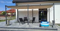 Aranżacja: Duża pergola ogrodowa z materiałowym dachem Niro 3x5,5 - Cream
