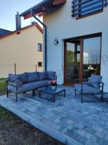 Aranżacja: Duża sofa ogrodowa modułowa ze stolikiem i fotelem Trapeno grafit