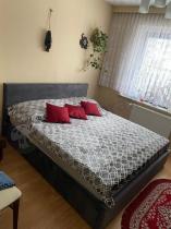 Aranżacja: Duże ciemnoszare łóżko do sypialni 180x200 Kennet III