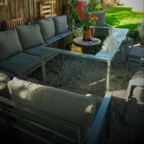 Aranżacja: Duży narożnik na taras ze stołem obiadowym fotelami i pufami Sodor Corner XXL - Silver