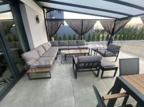 Aranżacja: Duży nowoczesny narożnik na taras z fotelami i pufami Panaon Corner XXL - Grey Teak