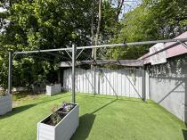 Aranżacja: Grafitowa pergola tarasowa 3x5,5 z materiałowym dachem - Niro Grey