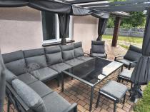 Aranżacja: Grafitowe nowoczesne meble tarasowe dla 10 osób Doros Corner XXL narożnik z 2 fotelami i 2 pufami - Dark Grey