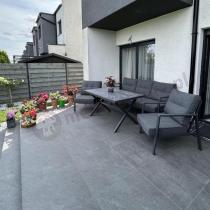 Aranżacja: Grafitowy komplet mebli ogrodowych z wysokim stołem, sofą i fotelami - Elke Dining - Grey