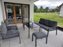 Aranżacja: Grafitowy zestaw mebli metalowych na taras Sodor Dining + pufy - Dark Grey