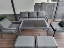 Aranżacja: Grafitowy zestaw mebli metalowych na taras Sodor Dining + pufy - Dark Grey