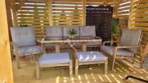 Aranżacja: Komplet mebli ogrodowych z sofą, regulowanymi fotelami i pufami - drewniany - Tavaro Dining Plus Wood