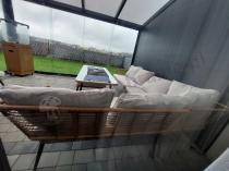 Aranżacja: Narożnik ogrodowy boho rope style z dużym stołem, fotelem i pufami Torgiano Corner XL beżowy