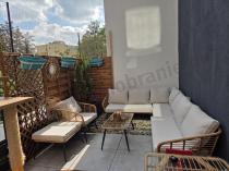 Aranżacja: Narożnik ogrodowy boho rope style z dużym stołem, fotelem i pufami Torgiano Corner XL beżowy