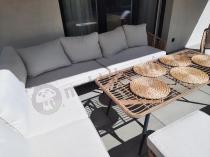 Aranżacja: Narożnik ogrodowy boho rope style z dużym stołem, fotelem i pufami Torgiano Corner XL beżowy