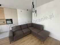 Aranżacja: Welurowy narożnik z funkcją spania Flavio Slim brązowy 255x214cm prawy