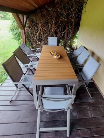 Aluminiowe meble obiadowe na taras - stół rozkładany do 210cm i 8 składanych krzeseł Tanami Daven Taupe