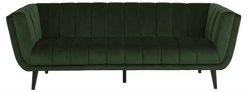 ciemnozielona welurowa sofa do salonu