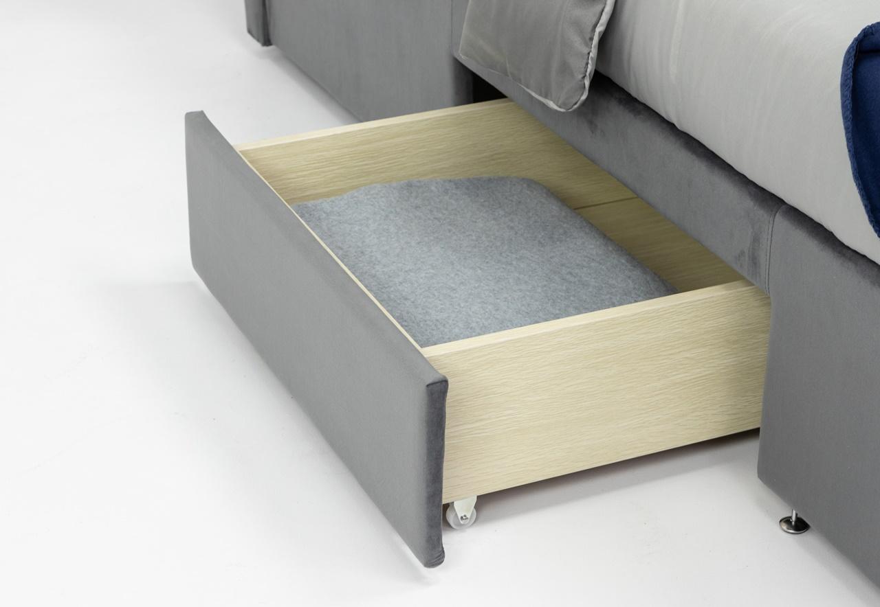 szuflada w prostym łóżku tapicerowanym