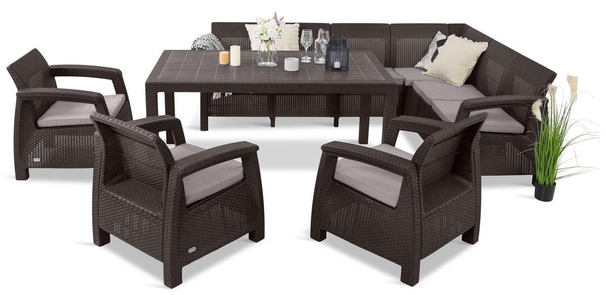 duży narożnik ogrodowy z fotelem i stołem obiadowym